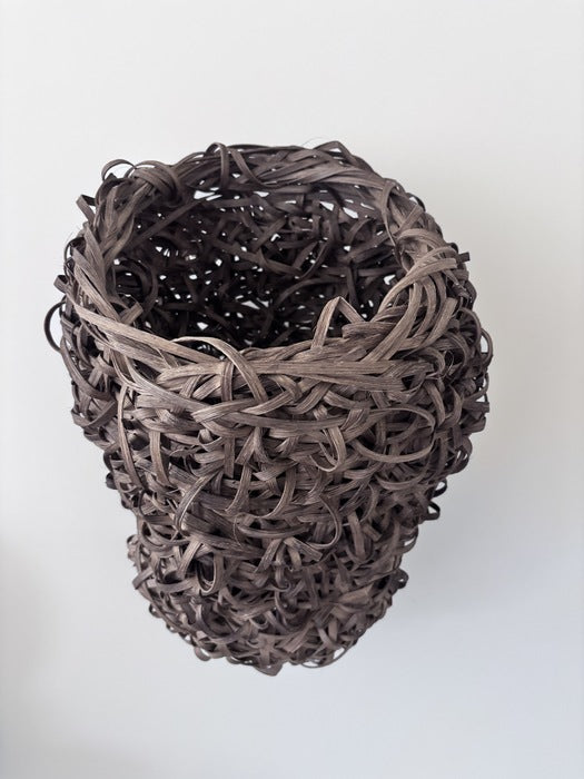 The Space Between, 2025, mixed media, 17 x 6 x 7 in. / 43.18 x 15.24 x 17.78 cm.