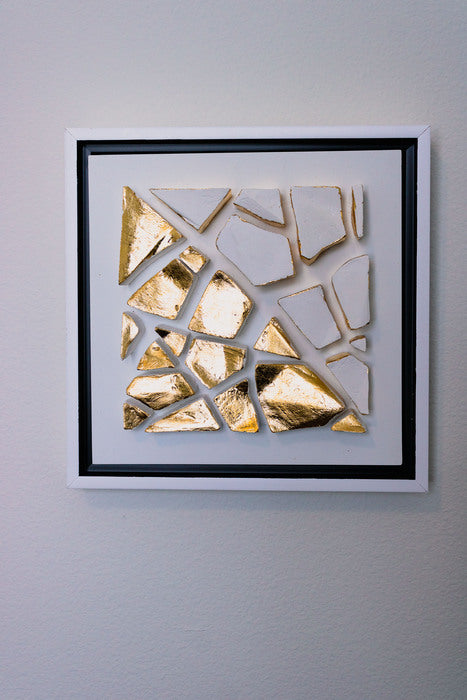 Gold Standard V, 2026, gold leaf on plaster, 8 x 8 in. / 20.32 x 20.32 cm.