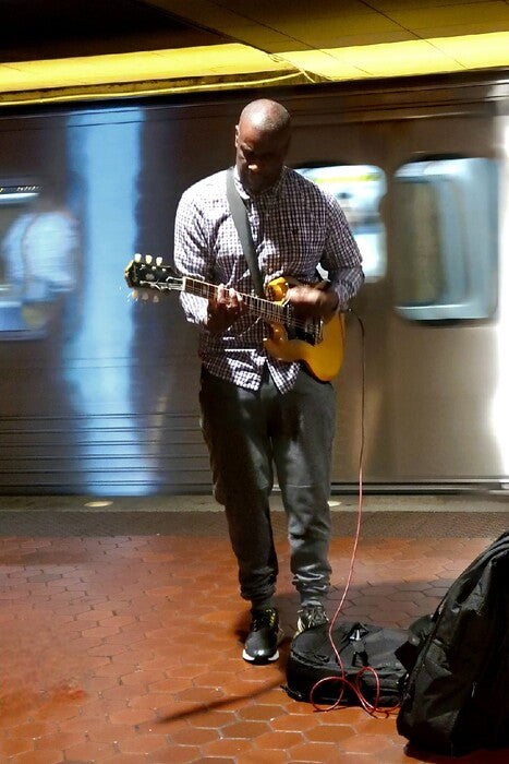 Music - Solo Guitarist, 2023, photography, 12 x 8 in. / 30.48 x 20.32 cm.