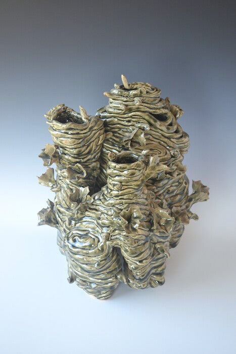 Enid, 2023, mixed media, 12 x 10 x 10 in. / 30.48 x 25.4 x 25.4 cm.