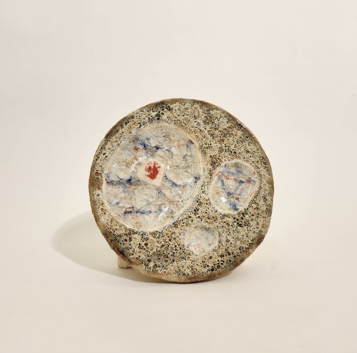 Organ System in Decay, 2024, ceramic and fused glass, 5 x 5 in. / 12.7 x 12.7 cm.