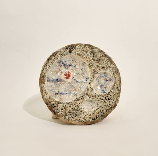 Organ System in Decay, 2024, ceramic and fused glass, 5 x 5 in. / 12.7 x 12.7 cm.