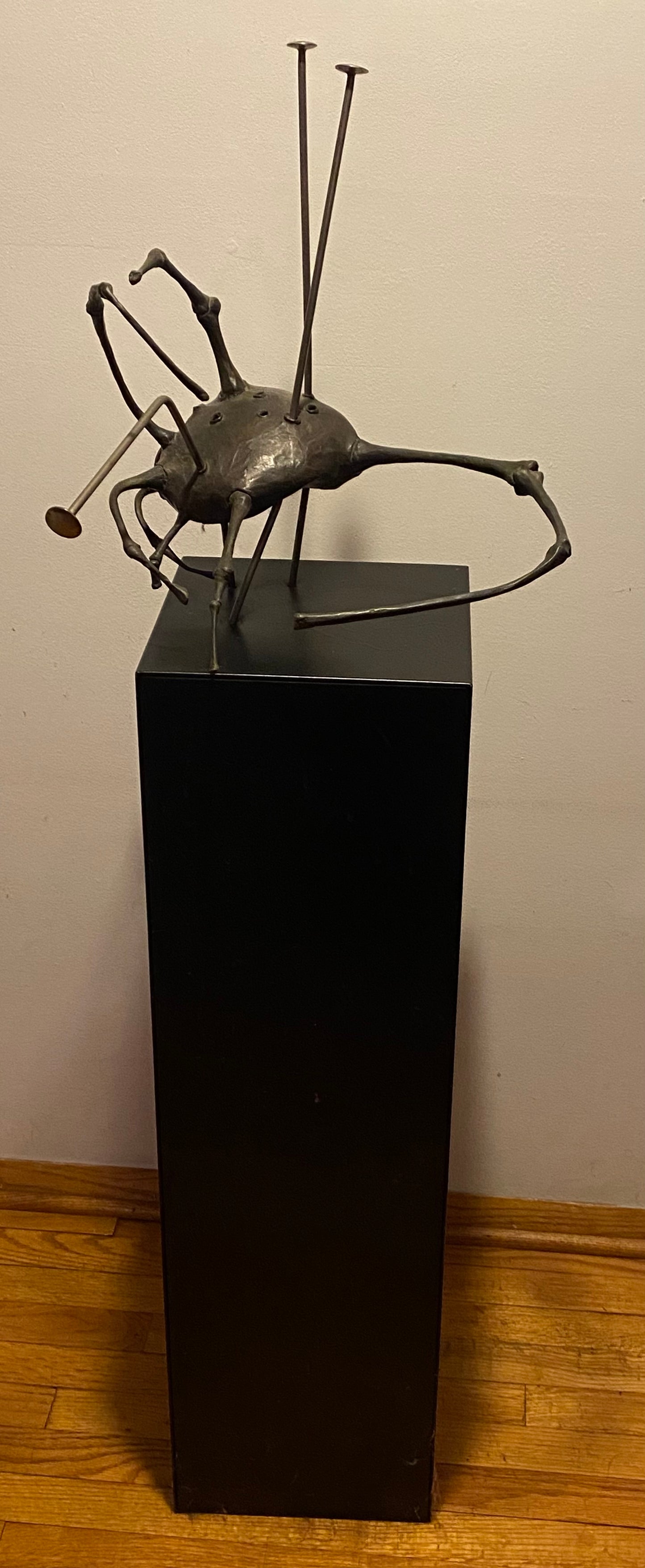 BrushBug, 1972, bronze and steel, 4 x 18 x 18 in. / 10.16 x 45.72 x 45.72 cm.