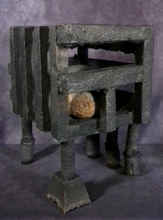 Cage 03, 2023, iron and stone, 11 x 8.5 in. / 27.94 x 21.59 cm.