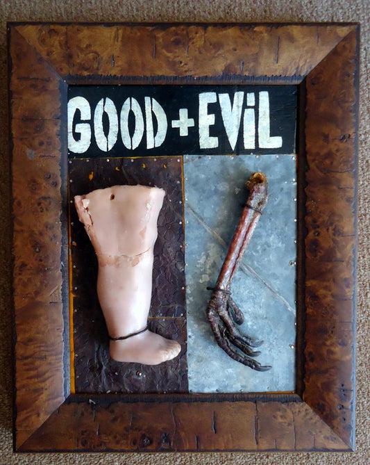 GOOD + EViL (Legs), 2019, found objects and material with acrylic on board, 16 x 12 in. / 40.64 x 30.48 cm.