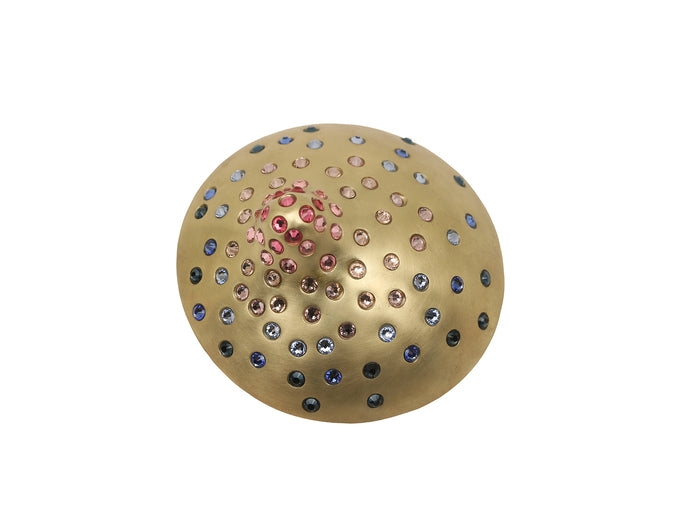 Ce N'est Pas Un Sein (They/Them), 2024, brass, steel and rhinestones, 2.5 x 2.5 in. / 6.35 x 6.35 cm.
