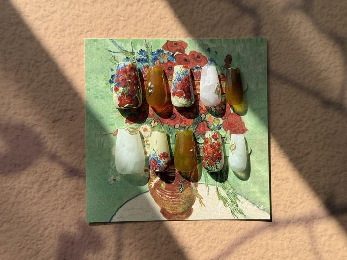 Amber Bloom, 2025, hand-painted reusable nails, 10 x 10 in. / 25.4 x 25.4 cm.