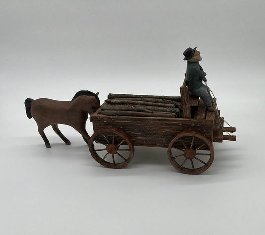 Cart Before the Horse, 2024, mixed media, 9 x 15 x 6 in. / 22.86 x 38.1 x 15.24 cm.