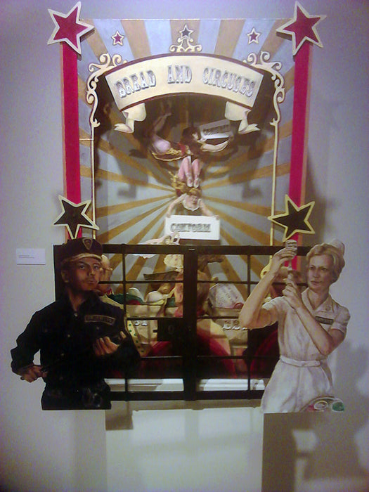 Bread and Circuses, 2020, oil on masonite, 24 x 36 x 14 in. / 60.96 x 91.44 x 35.56 cm.