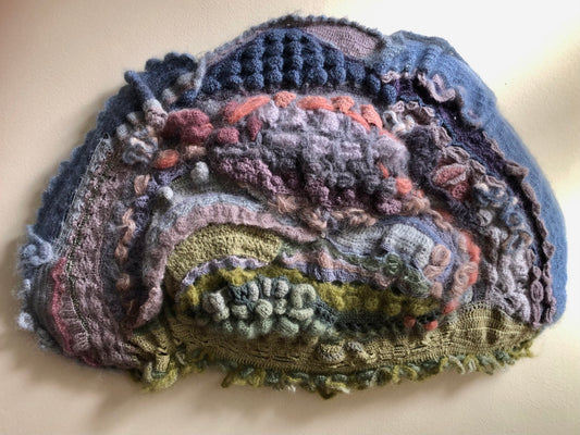 Big Sky Slip of Earth, 2025, crochet, 20 x 16 in. / 50.8 x 40.64 cm.