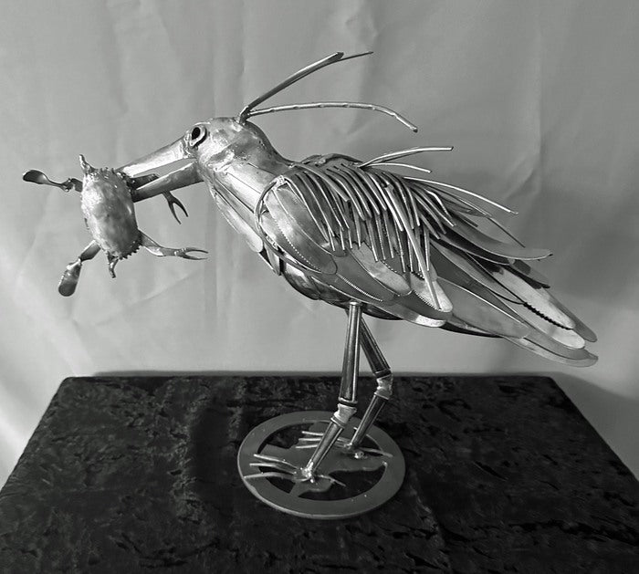 NIGHT HERON, 2024, stainless steel flatware, 14 x 6 in. / 35.56 x 15.24 cm.