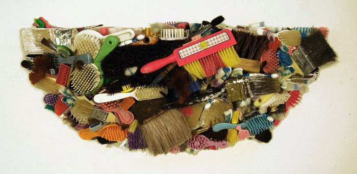 The Brush Off, 2012, mixed media, 11 x 26 x 5 in. / 27.94 x 66.04 x 12.7 cm.