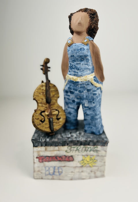 Woman Who Rocks Cello, 2023, ceramic, 11 x 4.75 in. / 27.94 x 12.06 cm.