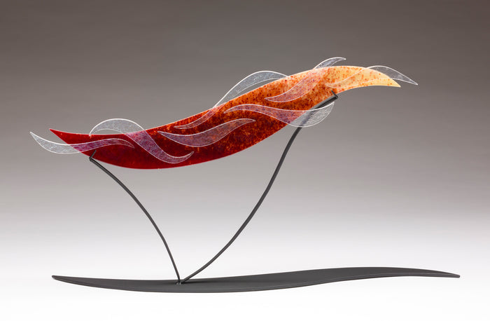 Chasing the Sunset, 2023, kiln-formed glass, 15 x 28 in. / 38.1 x 71.12 cm.
