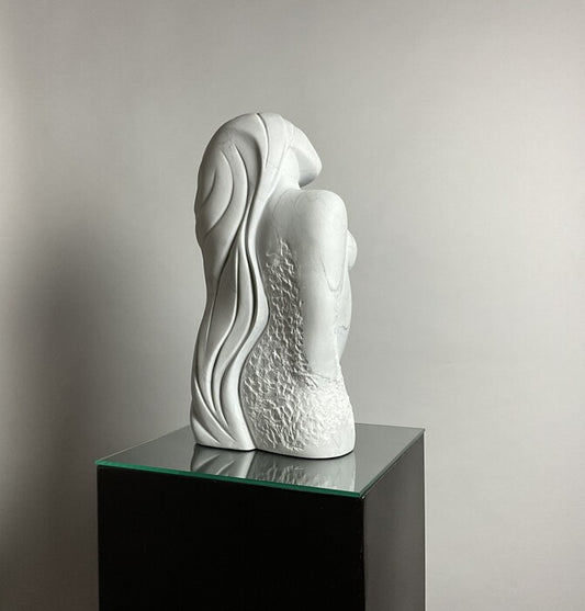 In The Flow, 2024, stone, 20 x 9 x 7 in. / 50.8 x 22.86 x 17.78 cm.