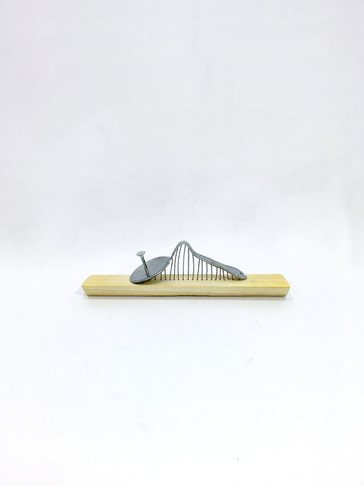 Man at Piano, 2021, sculpture, 2.5 x 2 x 8.9 in. / 6.35 x 5.08 x 22.6 cm.