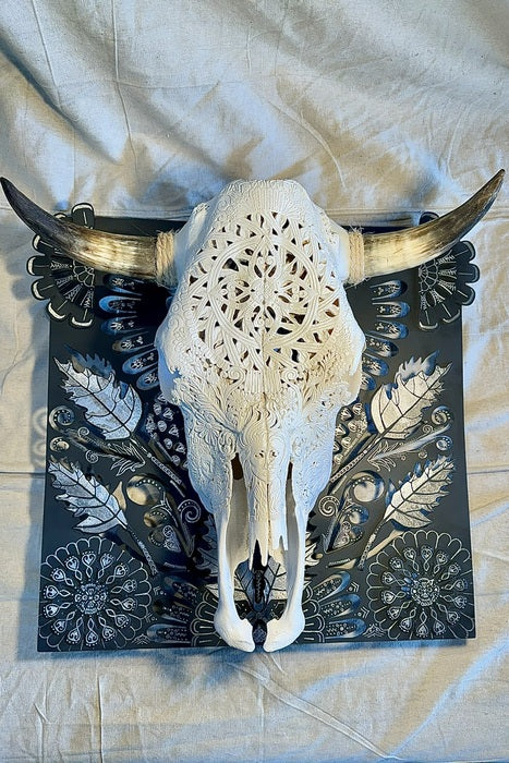 Mandala Skull, 2024, cow skull and steel, 21 x 23 x 11 in. / 53.34 x 58.42 x 27.94 cm.