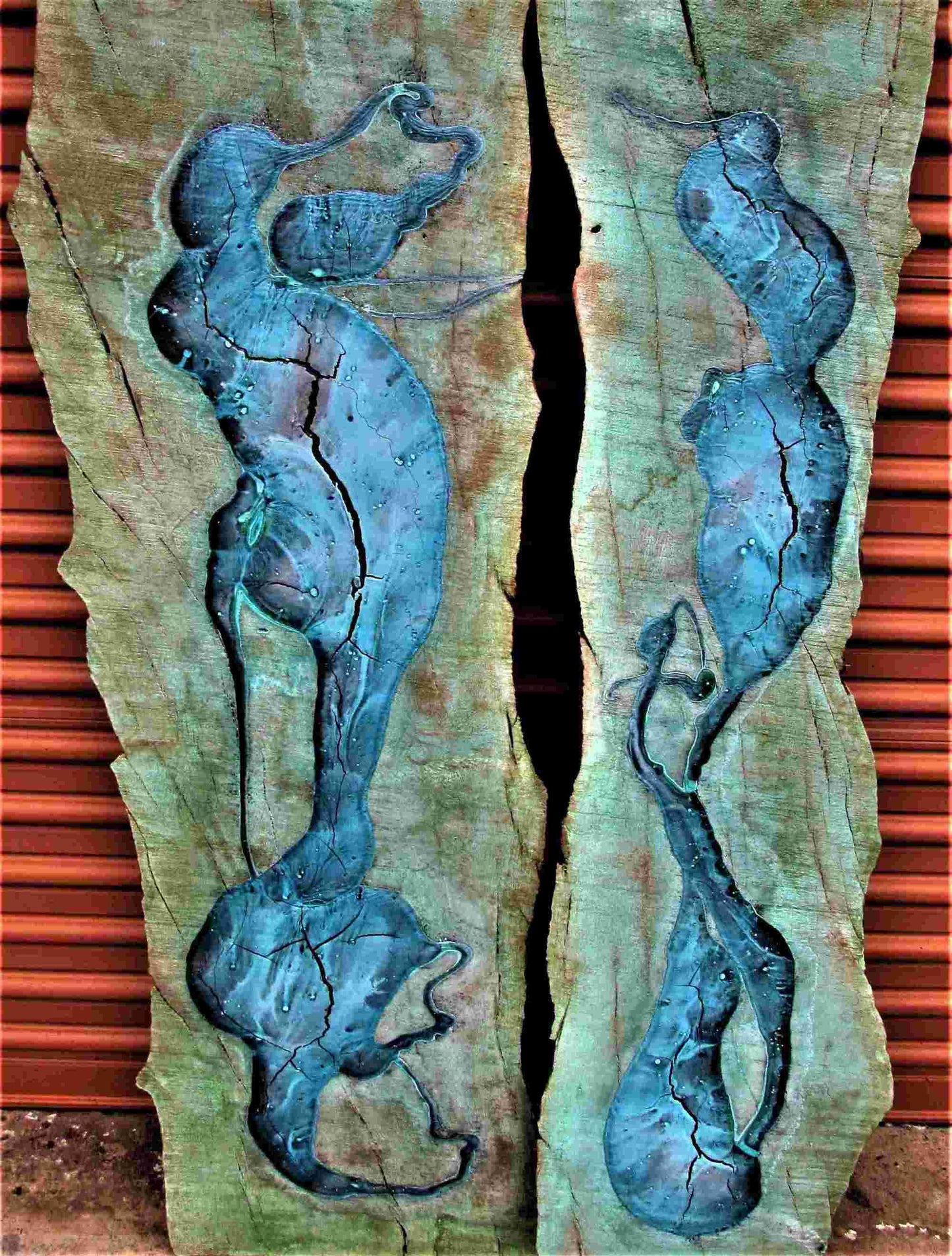 Pair of Cranes, 2022, oxidized copper and bronze on weathered wood, 50 x 30 in. / 127 x 76.2 cm.