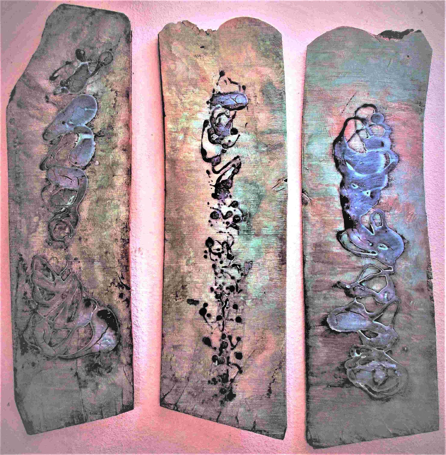 Serenity (Tryptic), 2022, oxidized copper and bronze on weathered wood, 48 x 36 in. / 121.92 x 91.44 cm.