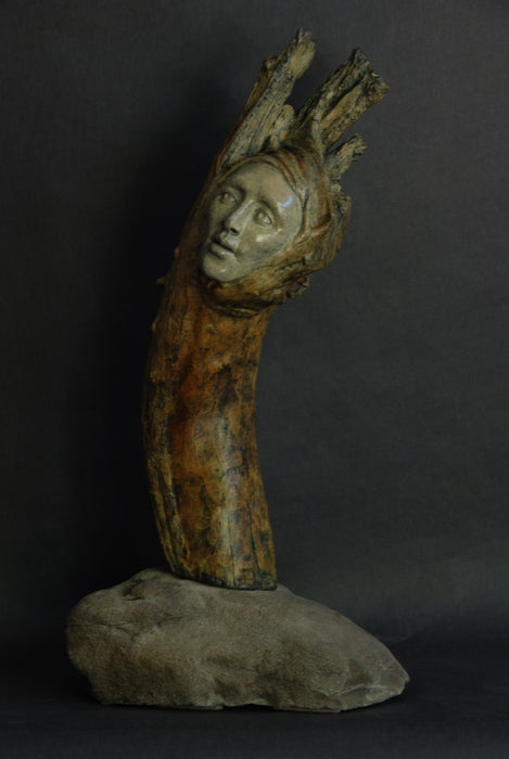 Unity, 2020, cast bronze on natural stone, 19 x 12 x 12 in. / 48.26 x 30.48 x 30.48 cm.