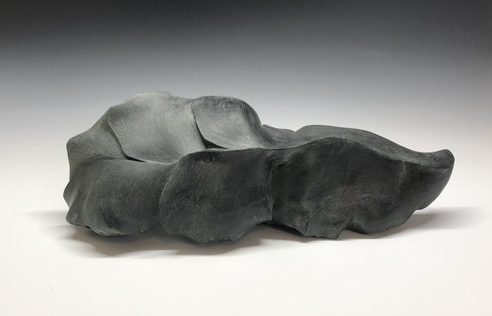 Versno, 2020, soapstone, 6 x 13 x 5 in. / 15.24 x 33.02 x 12.7 cm.